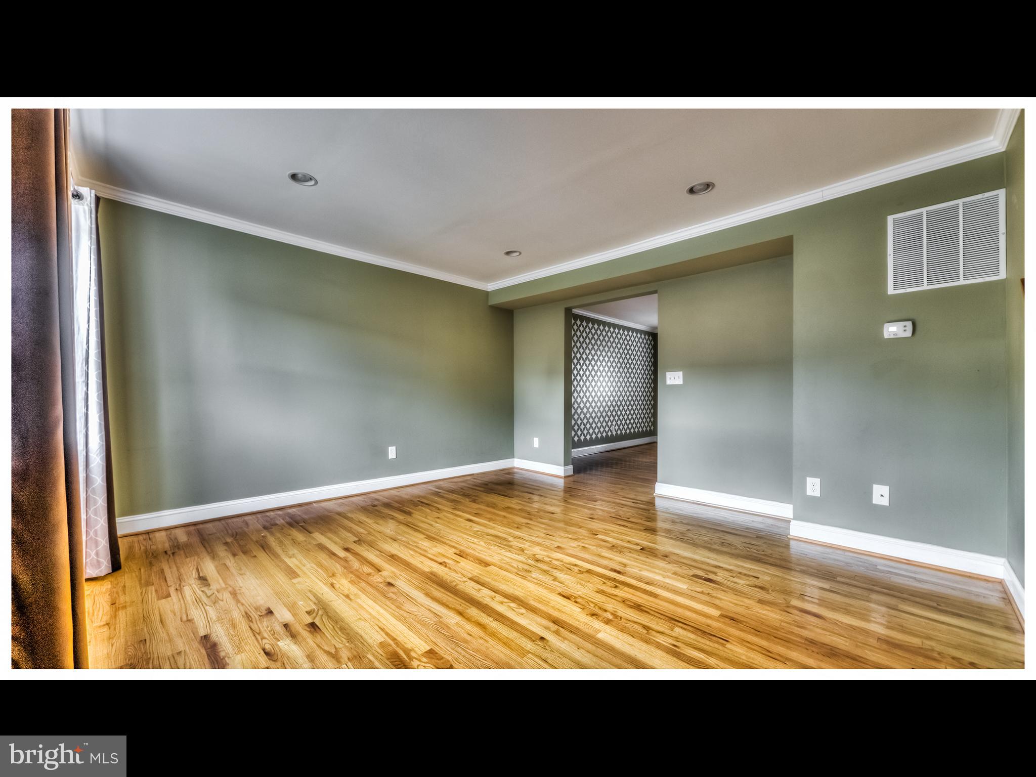 836 Bradhurst Road Baltimore, MD 21212 - Photo 9 of 24 a view of an empty room with a bathroom