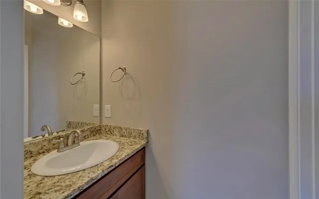 a bathroom with a toilet and a bathtub