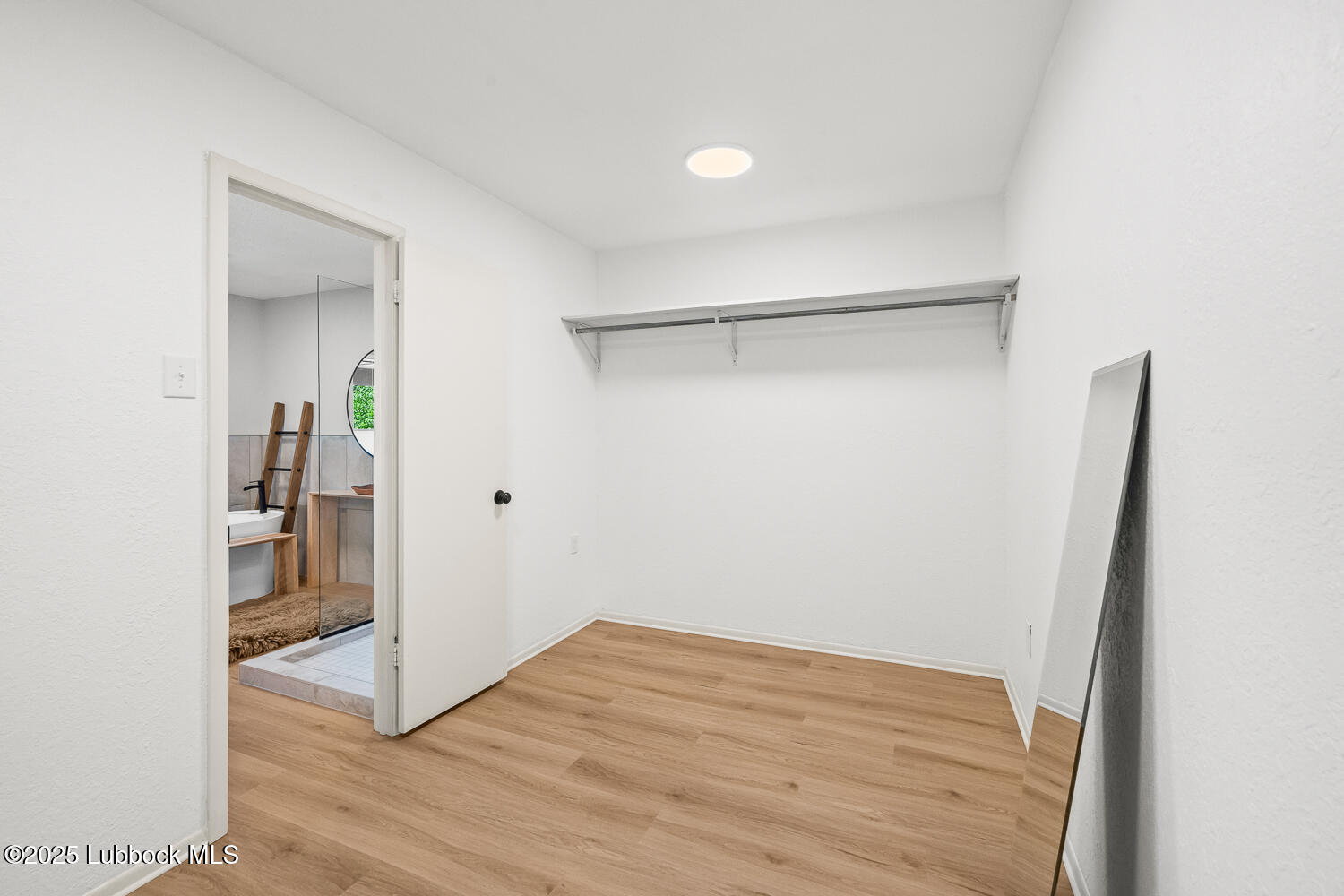 146 Pony Express Trail Buffalo Springs, TX 79404 - Photo 18 of 48 a view of an empty room