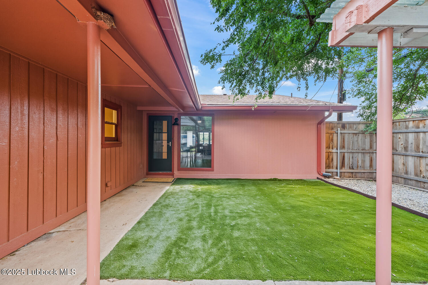 146 Pony Express Trail Buffalo Springs, TX 79404 - Photo 26 of 48 a view of front door of house with yard