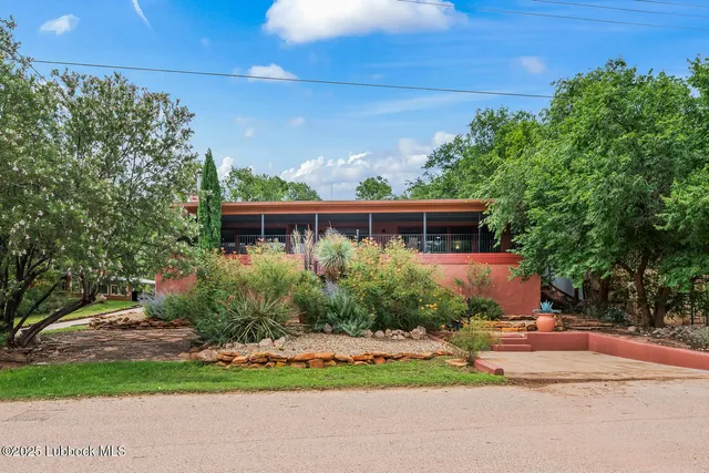 a view of a lake with a yard
