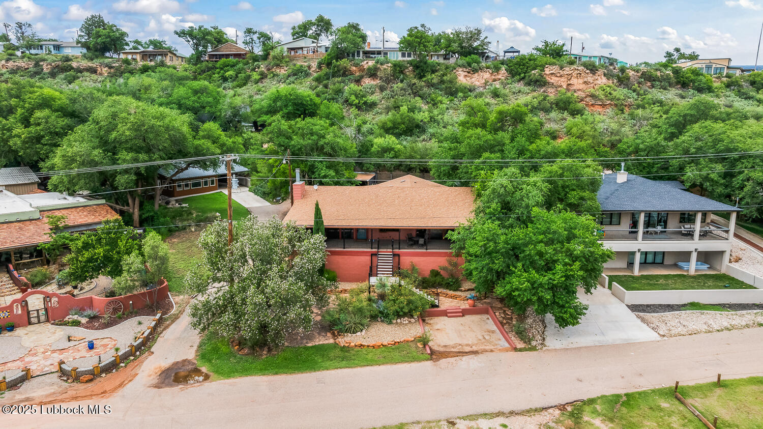 146 Pony Express Trail Buffalo Springs, TX 79404 - Photo 36 of 48 an aerial view of a house