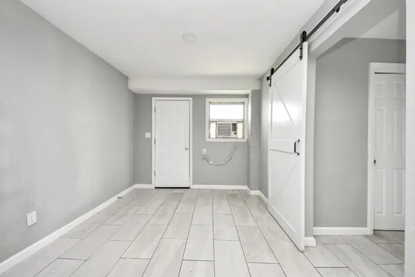 a view of a room with an empty space