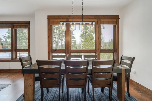 a open kitchen with stainless steel appliances granite countertop a lot of counter space and wooden floors