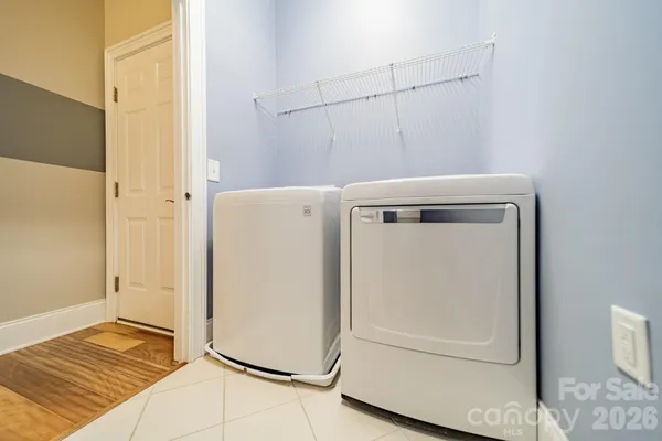 a view of a storage & utility room with closet
