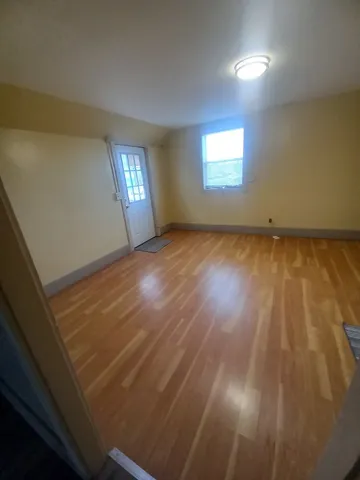 a view of an empty room and window