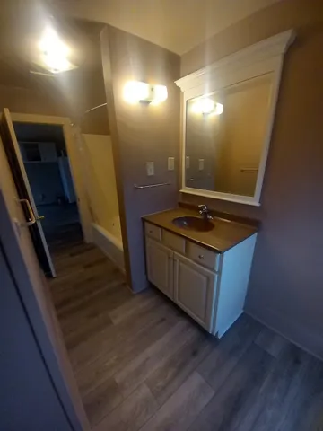 a kitchen with a stove and a refrigerator