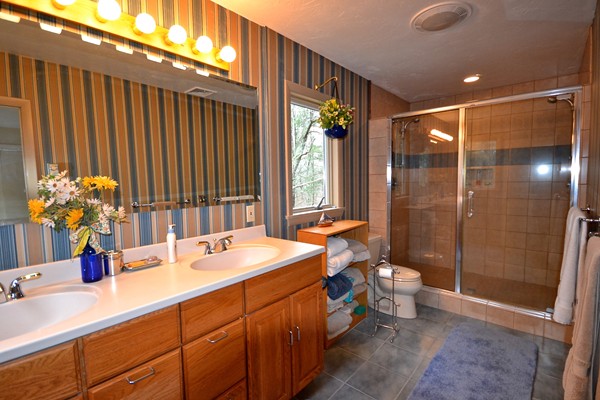 98 Register Road Marion, MA 02738 - Photo 23 of 29 a bathroom with a double vanity sink toilet and shower