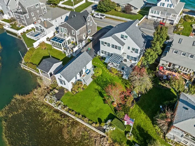 a kitchen with stainless steel appliances a stove a sink and a microwave