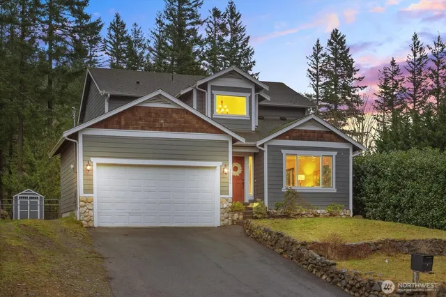 a front view of a house with yard