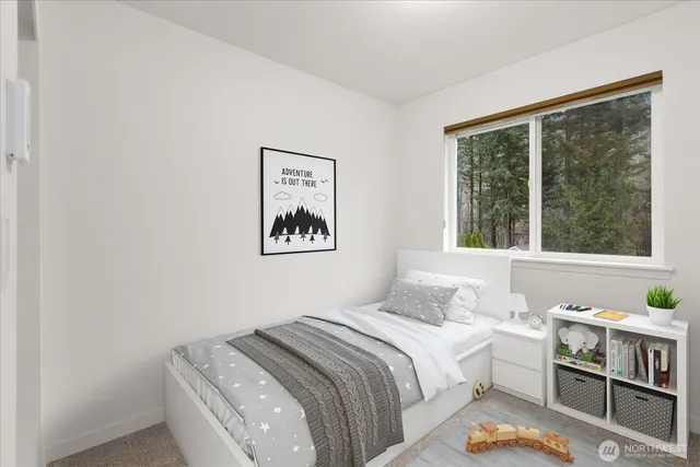 an aerial view of a house with swimming pool and outdoor space