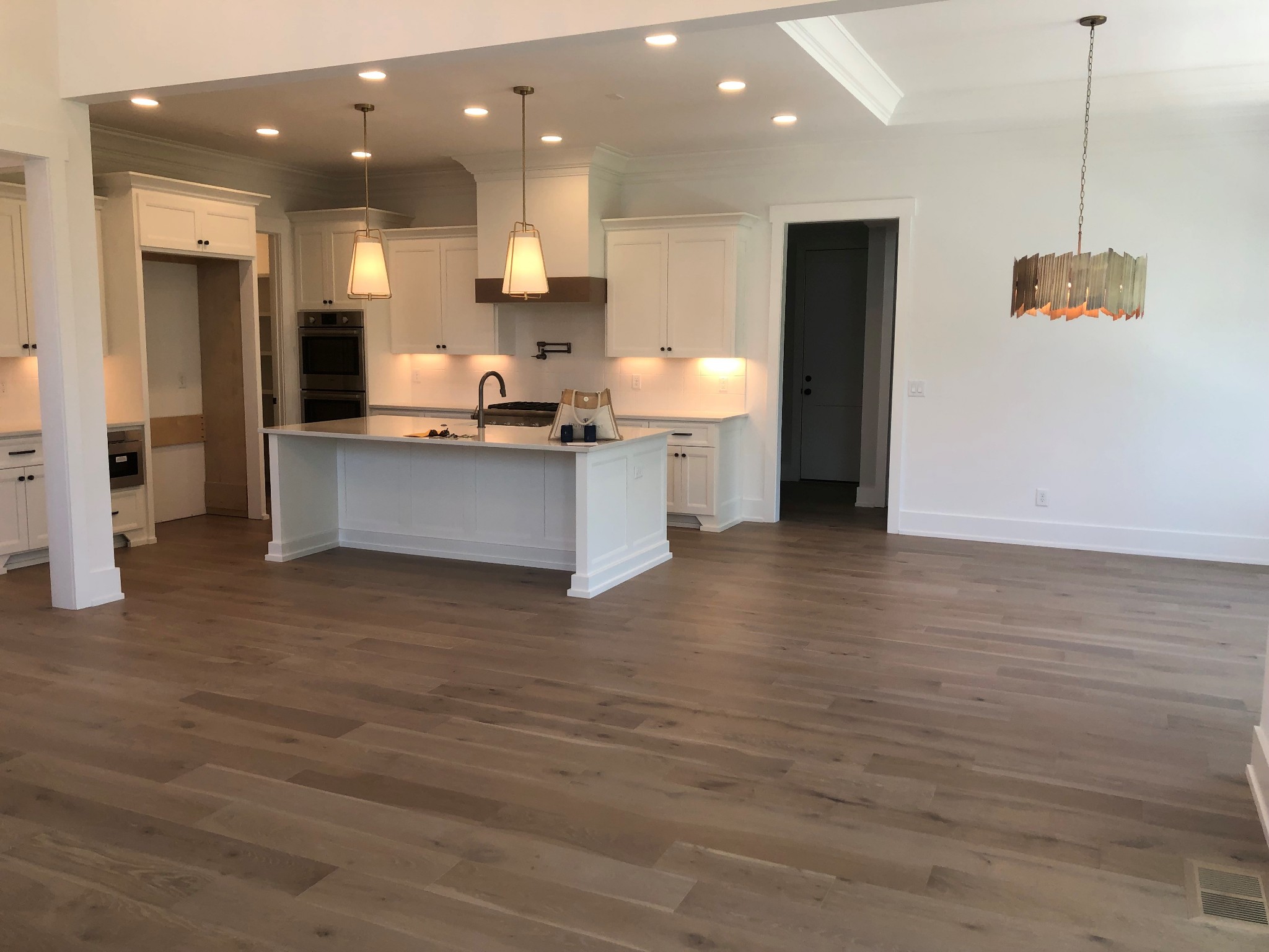 3073 Long Branch Circle Franklin, TN 37064 - Photo 3 of 13 a large kitchen with lots of counter space a sink appliances and cabinets
