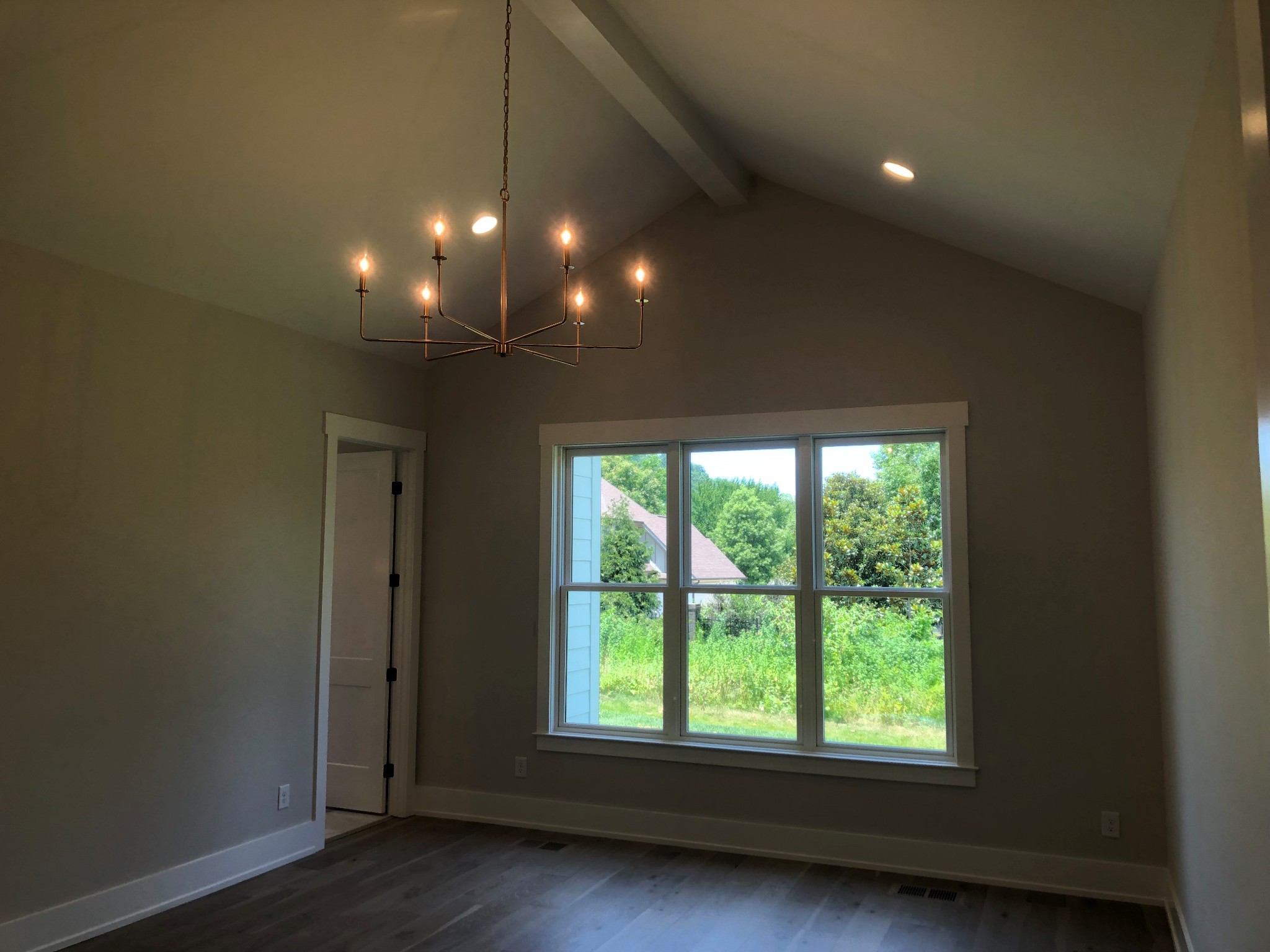 3073 Long Branch Circle Franklin, TN 37064 - Photo 6 of 13 a view of empty room with wooden floor and fan