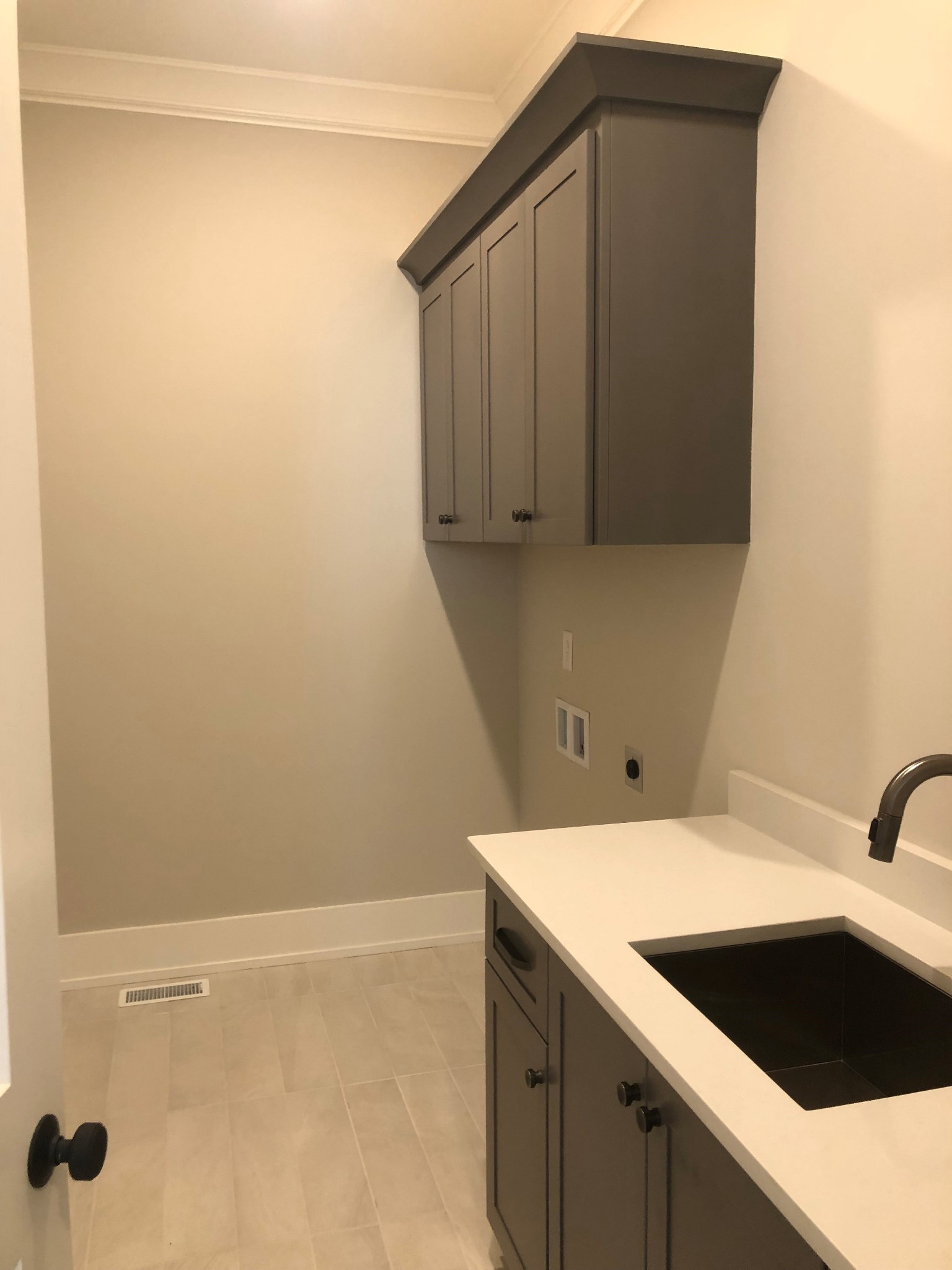 3073 Long Branch Circle Franklin, TN 37064 - Photo 9 of 13 a kitchen with a sink and cabinets