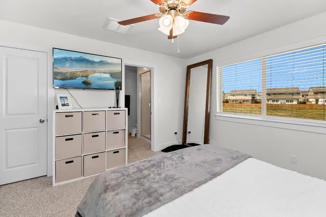 a bathroom with a shower and a sink
