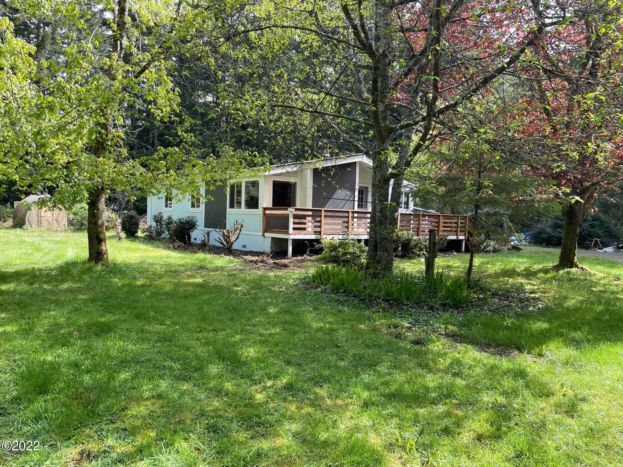 121 East Castle Road Waldport, OR 97394 - Photo 3 of 25 Side Yard