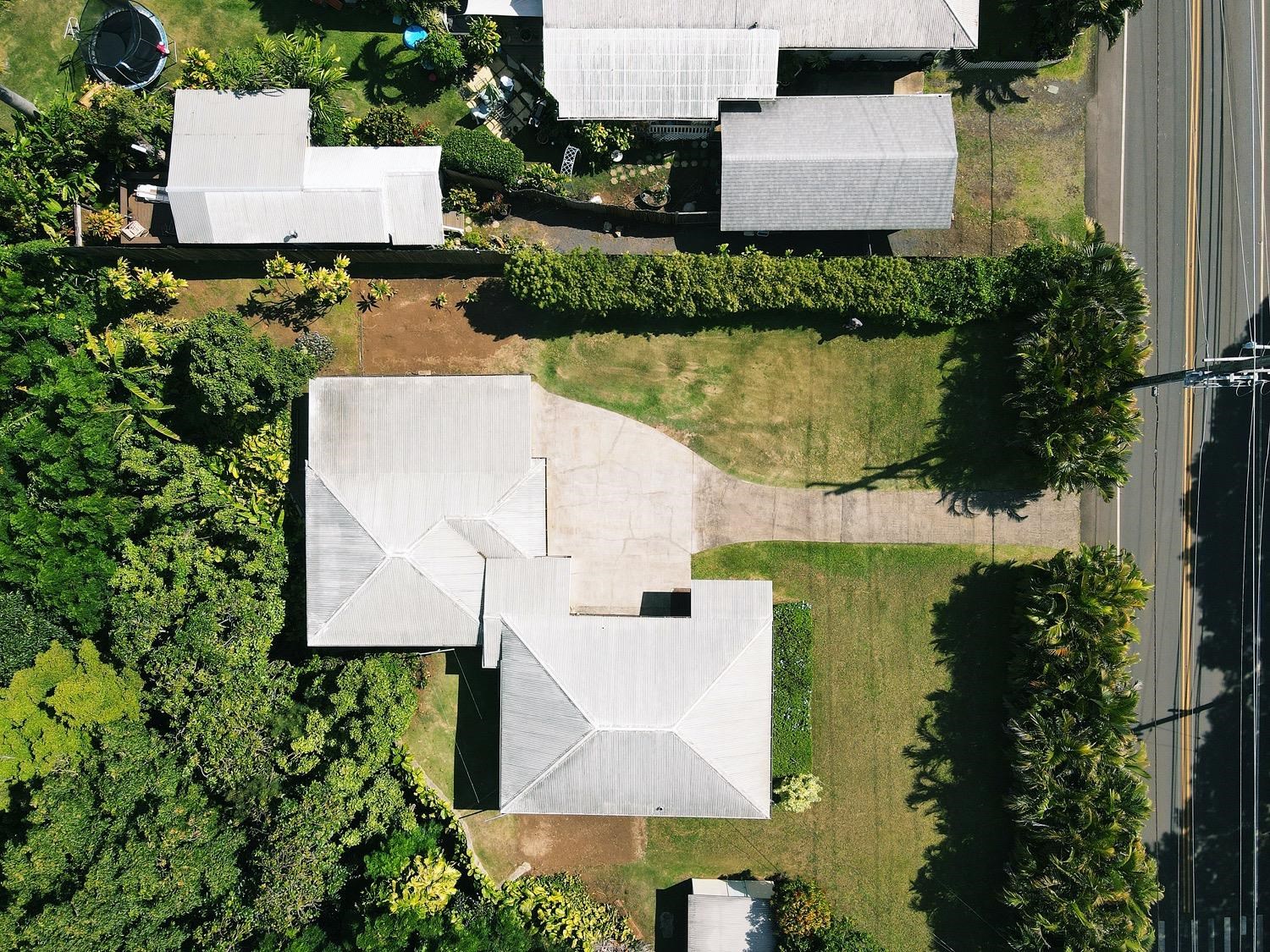 741 Haiku Road Haiku, HI 96708 - Photo 10 of 26 an aerial view of a house with yard swimming pool and outdoor seating