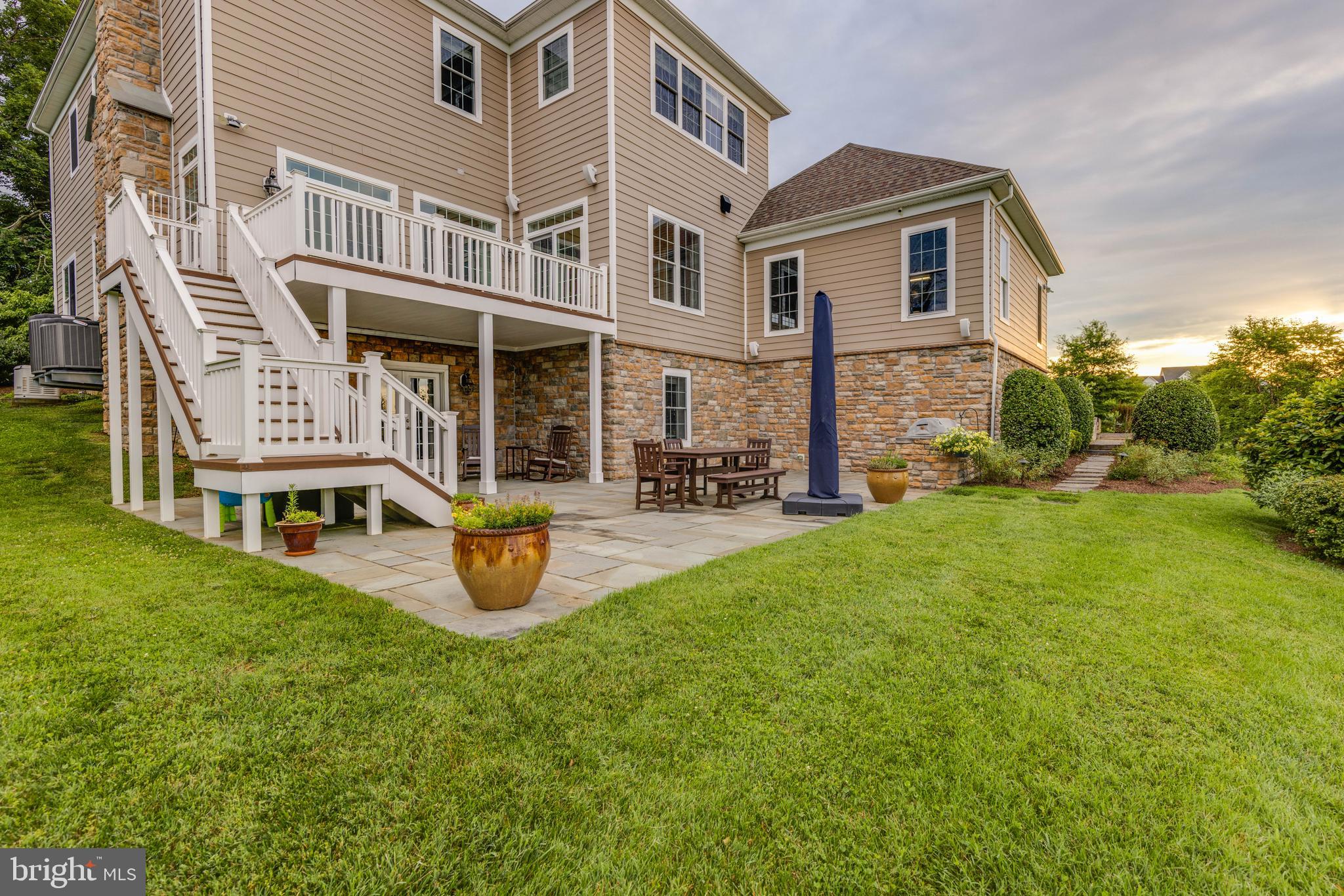 3913 Briar Knoll Circle Phoenix, MD 21131 - Photo 20 of 39 a front view of a building with garden
