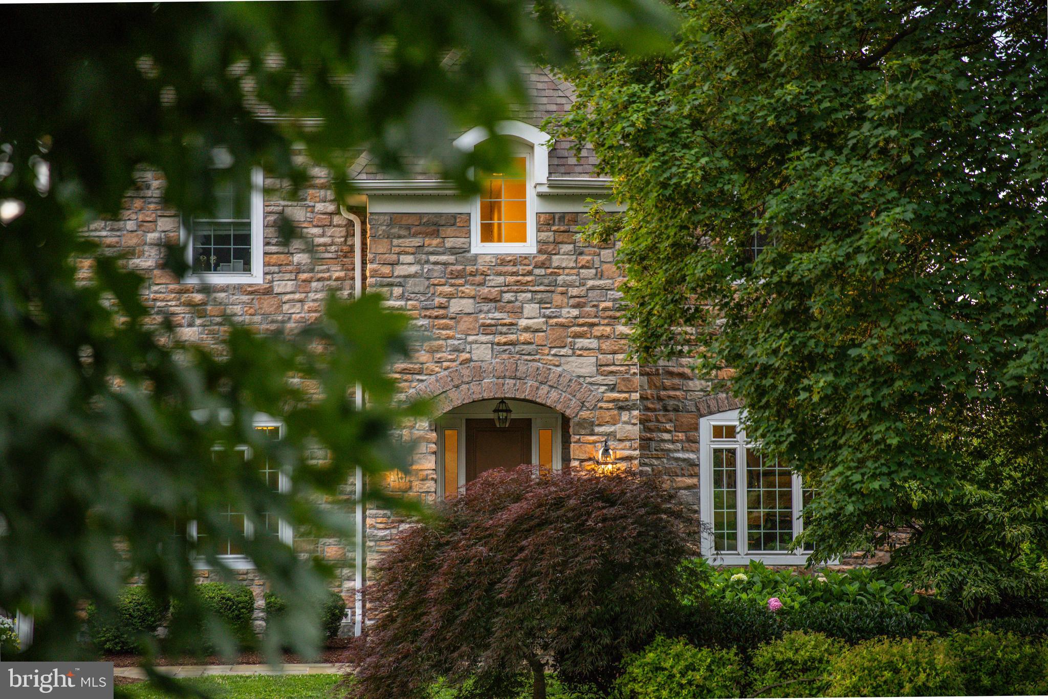 3913 Briar Knoll Circle Phoenix, MD 21131 - Photo 2 of 39 a front view of a house with plants