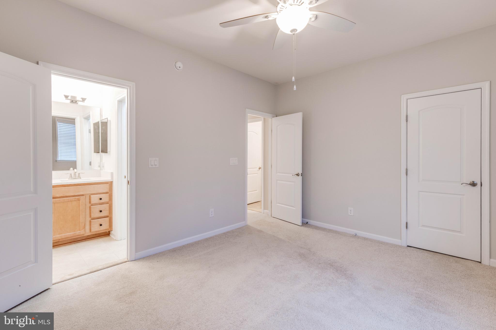 3913 Briar Knoll Circle Phoenix, MD 21131 - Photo 38 of 39 an empty room with a bathroom