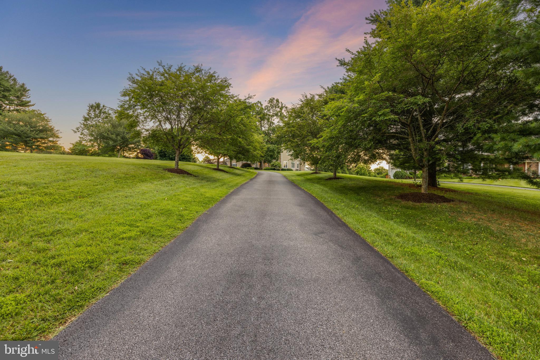3913 Briar Knoll Circle Phoenix, MD 21131 - Photo 9 of 39 a view of a lake with a big yard