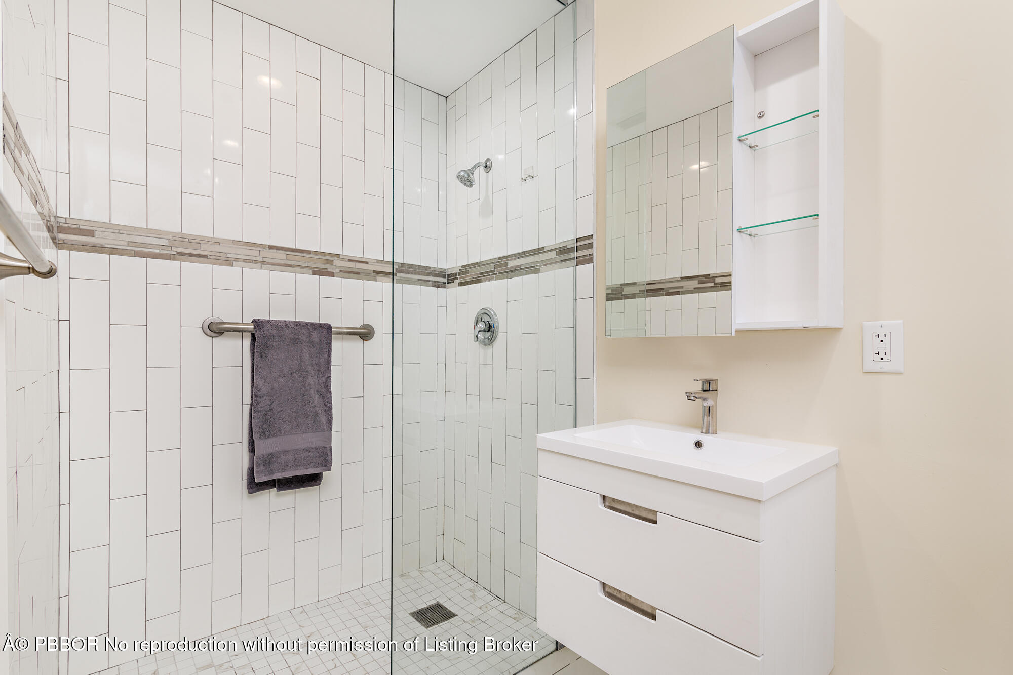 369 Valley Forge Road West Palm Beach, FL 33405 - Photo 14 of 19 a bathroom with a shower sink and mirror