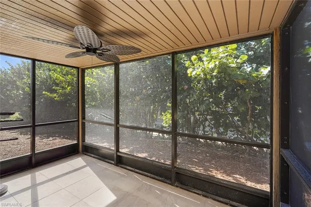 a view of a room with a lot of windows