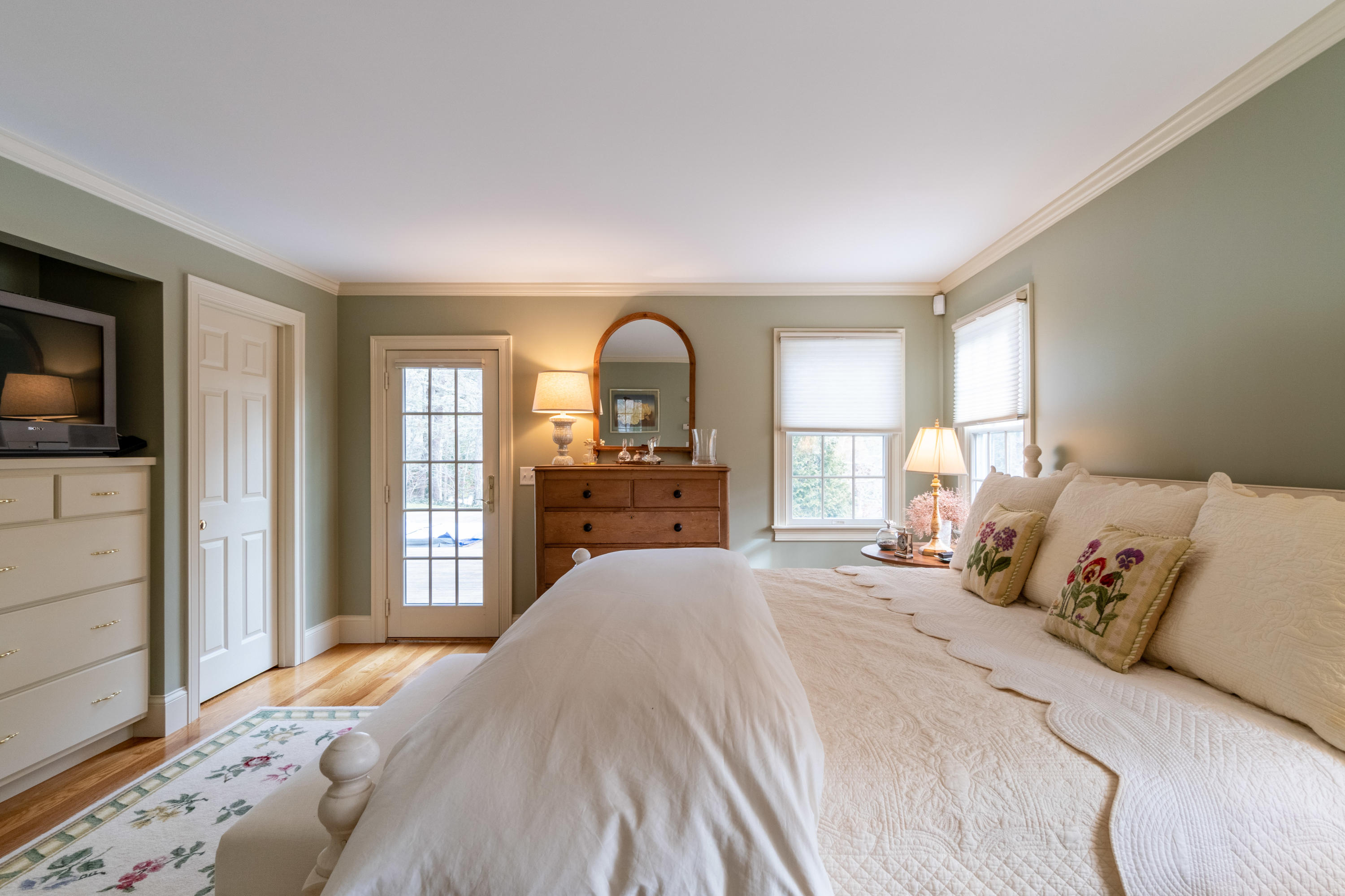 150 Training Field Road Chatham, MA 02633 - Photo 15 of 42 a bedroom with a bed and a large window