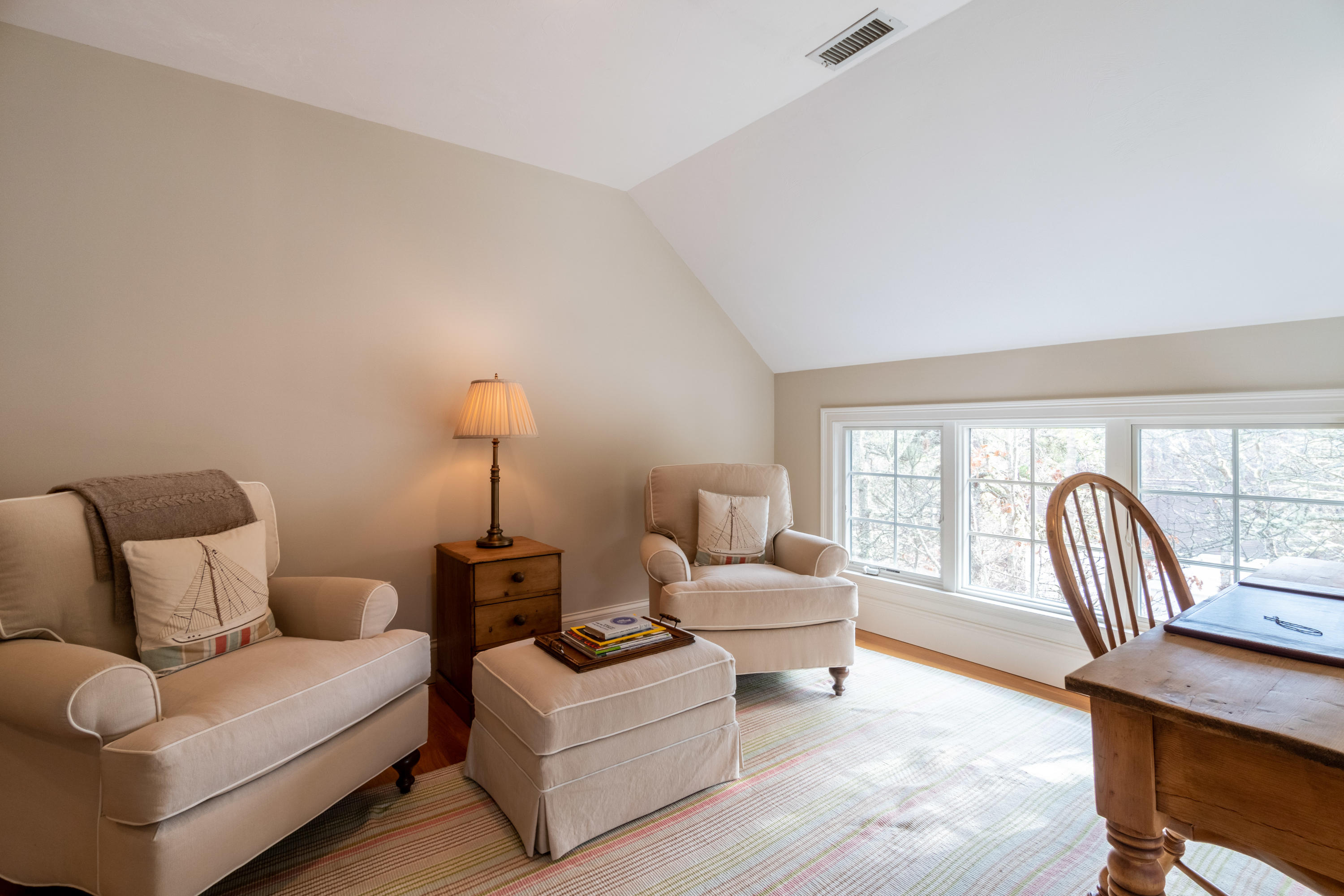 150 Training Field Road Chatham, MA 02633 - Photo 16 of 42 a living room with furniture and a window