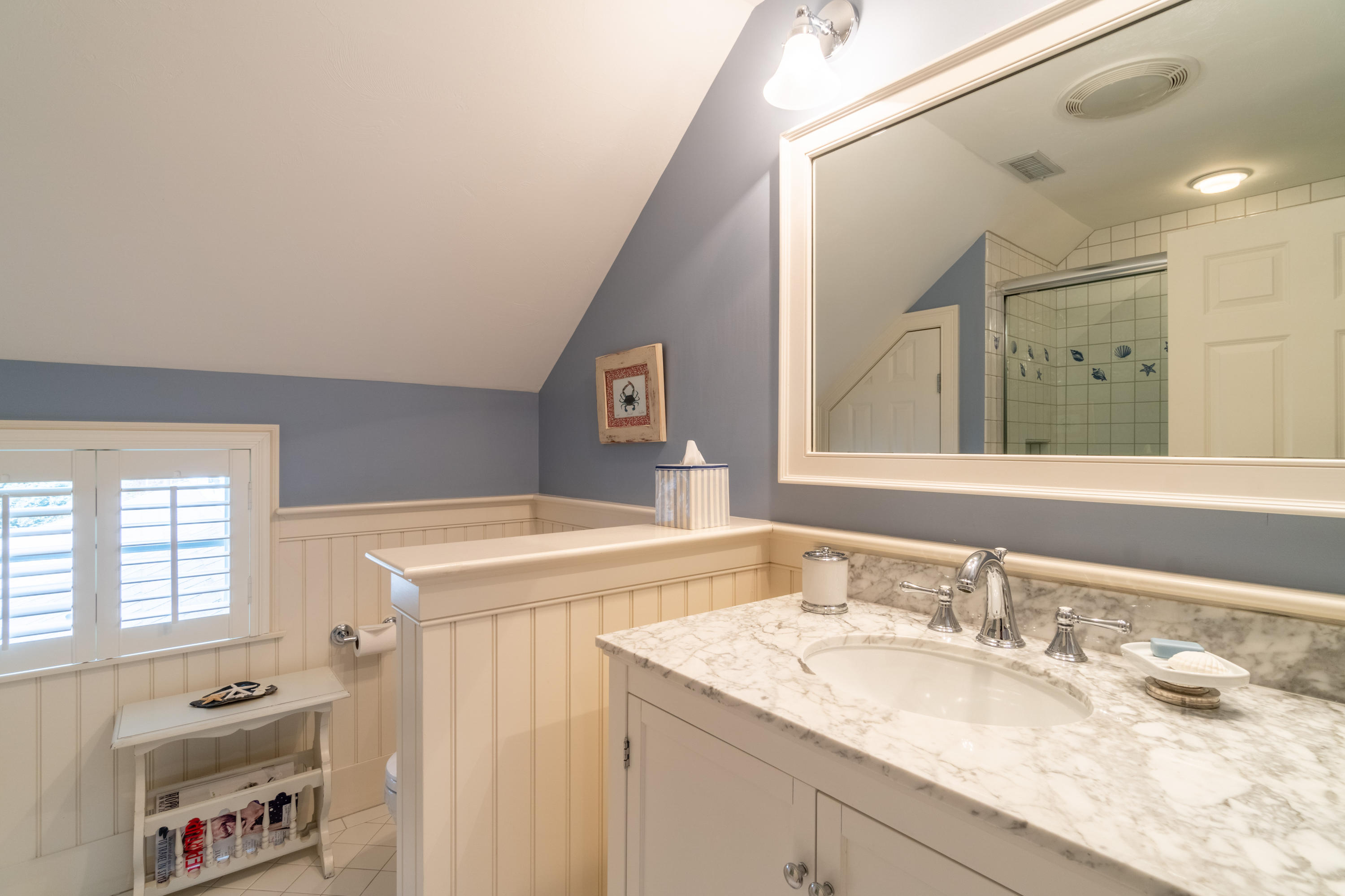 150 Training Field Road Chatham, MA 02633 - Photo 18 of 42 a bathroom with a granite countertop sink and a mirror