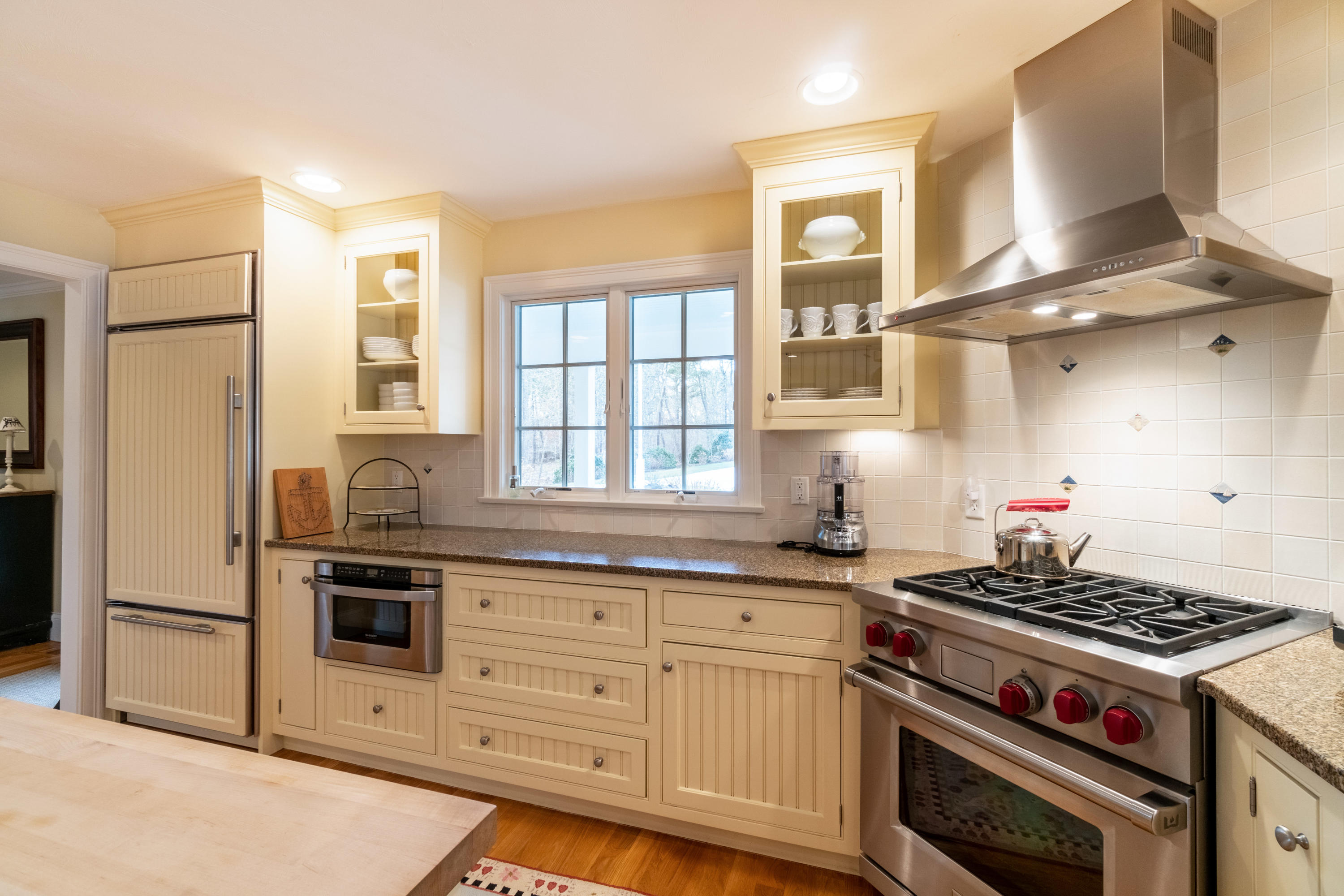 150 Training Field Road Chatham, MA 02633 - Photo 35 of 42 a kitchen with stainless steel appliances a stove a sink and a refrigerator