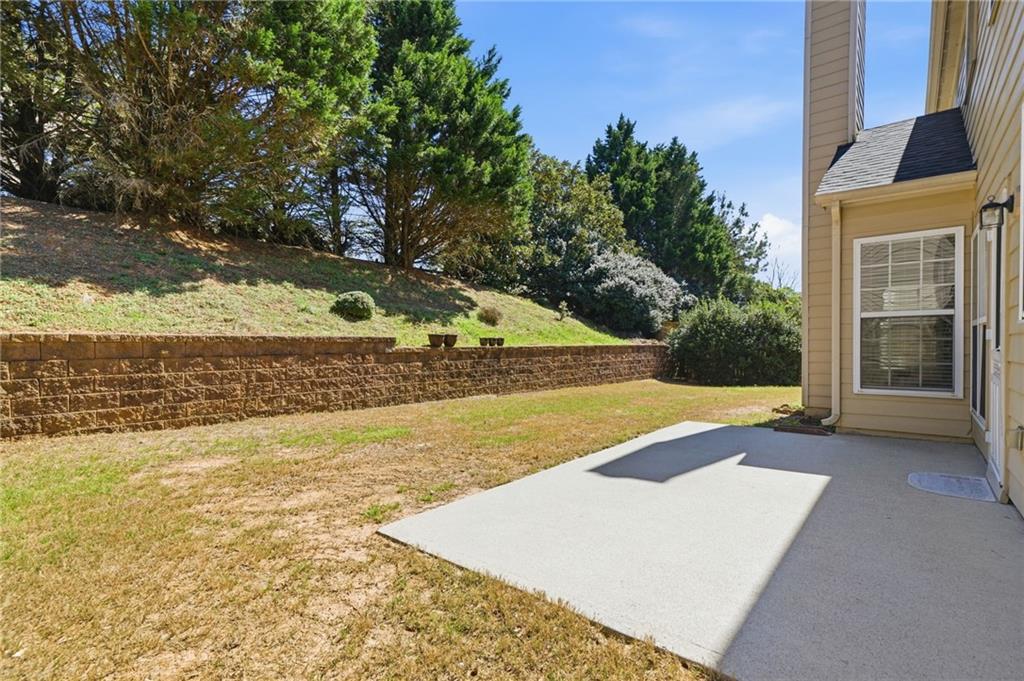 310 Hammersmith Drive Suwanee, GA 30024 - Photo 47 of 55 a view of an outdoor space and a yard