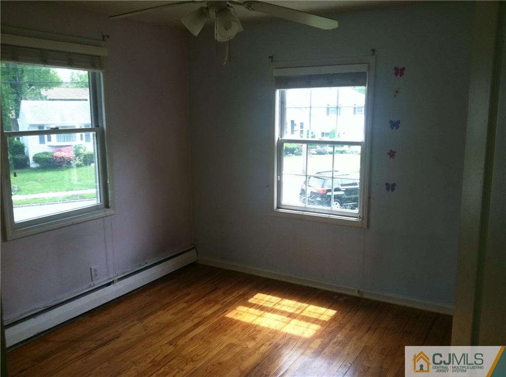 9 Eastlick Road Edison, NJ 08817 - Photo 12 of 20 a view of an empty room and window