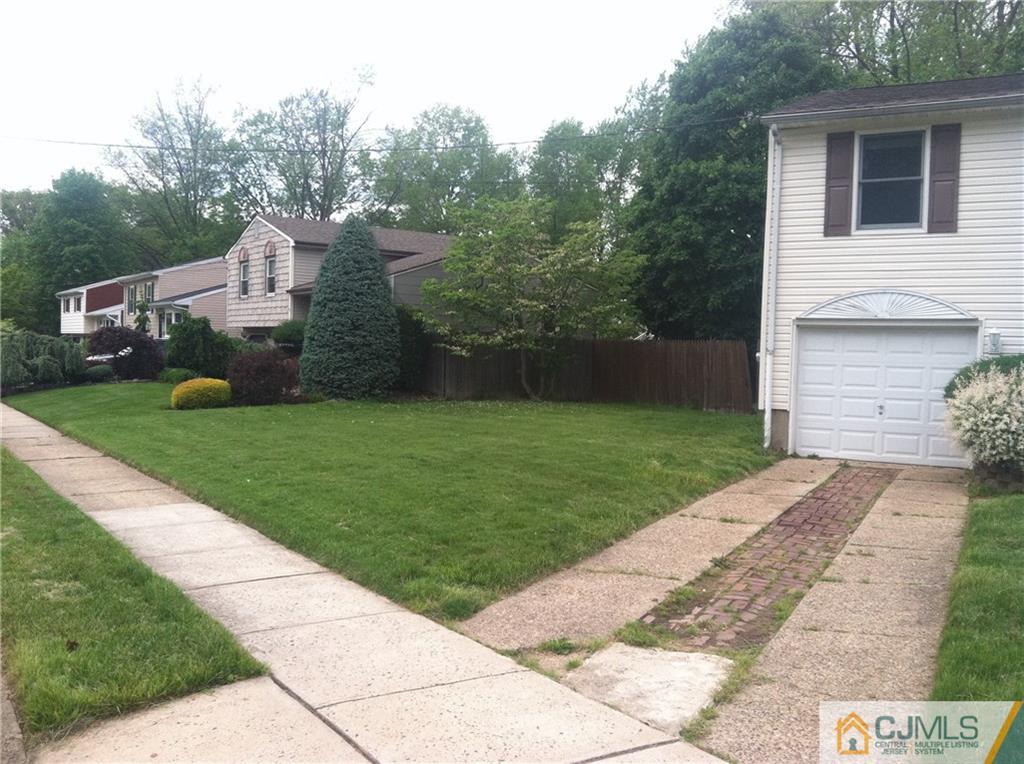 9 Eastlick Road Edison, NJ 08817 - Photo 18 of 20 a front view of a house with garden