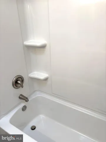 a bathroom with a tub