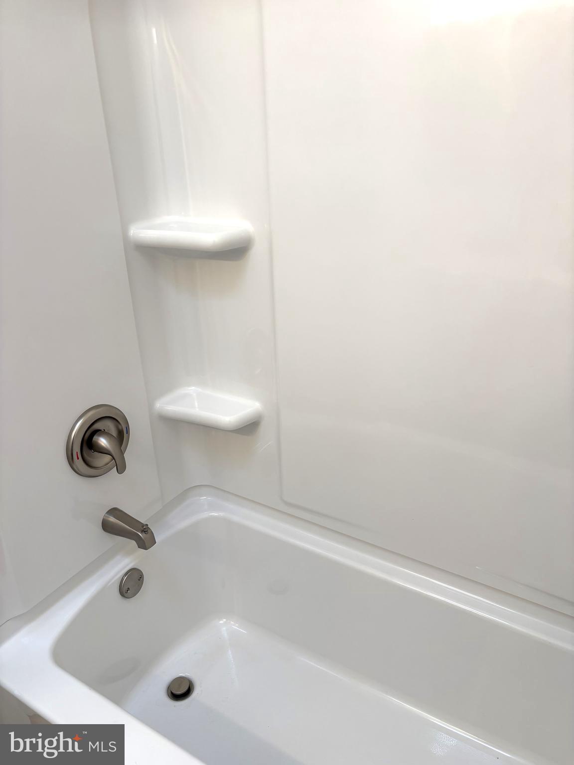 3820 2nd Street Baltimore, MD 21225 - Photo 19 of 23 a bathroom with a tub