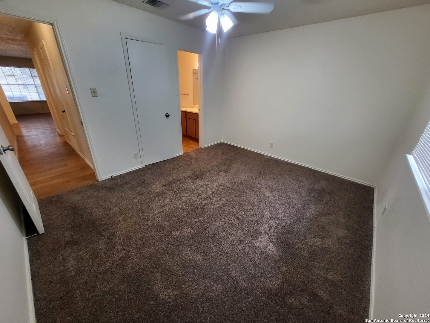 12204 Ridge Crown Street San Antonio, TX 78247 - Photo 9 of 10 a view of a livingroom with a chandelier