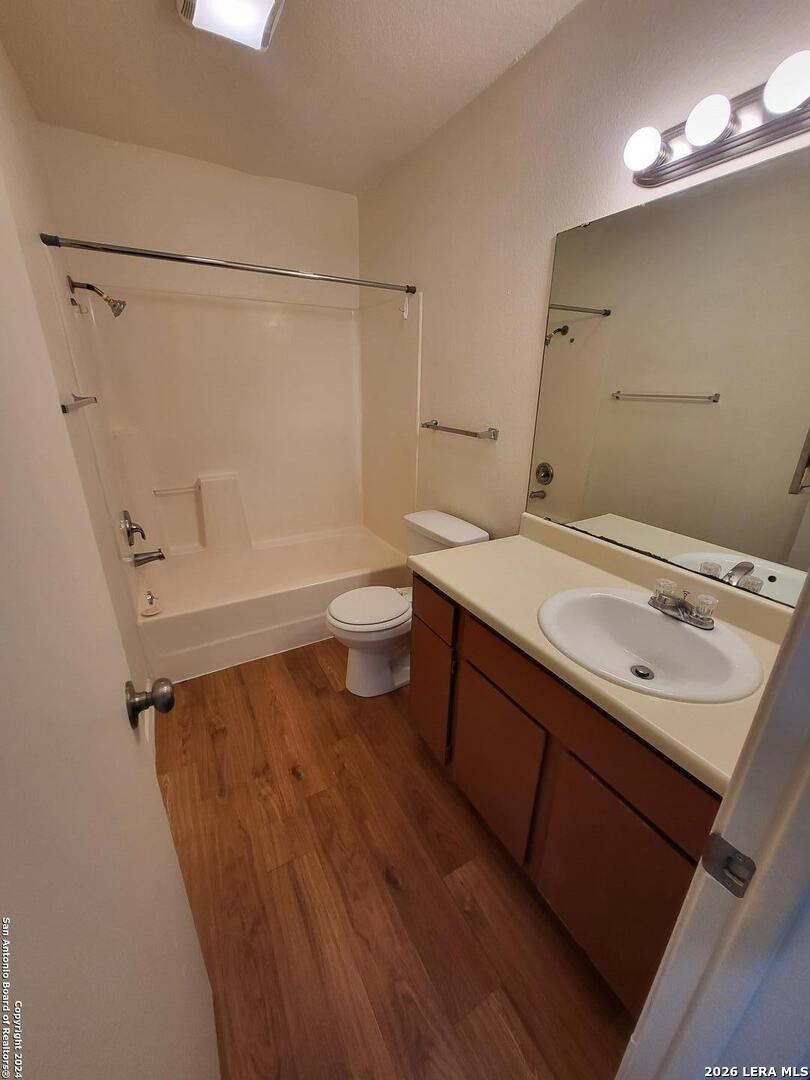 12204 Ridge Crown Street San Antonio, TX 78247 - Photo 10 of 10 a bathroom with a sink a toilet and shower