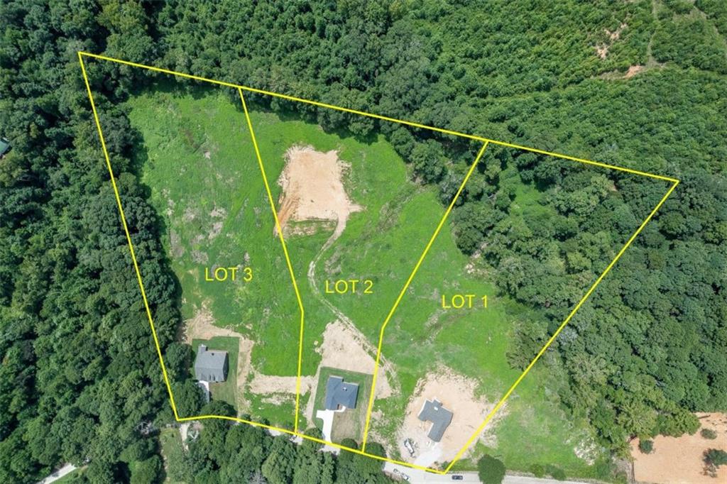 295 Anderson Thomas Road Martin, GA 30557 - Photo 1 of 44 a green field with lots of trees in the background