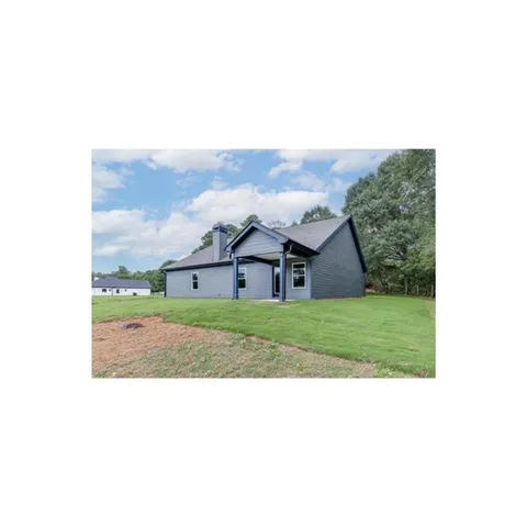 a picture of a house with a yard