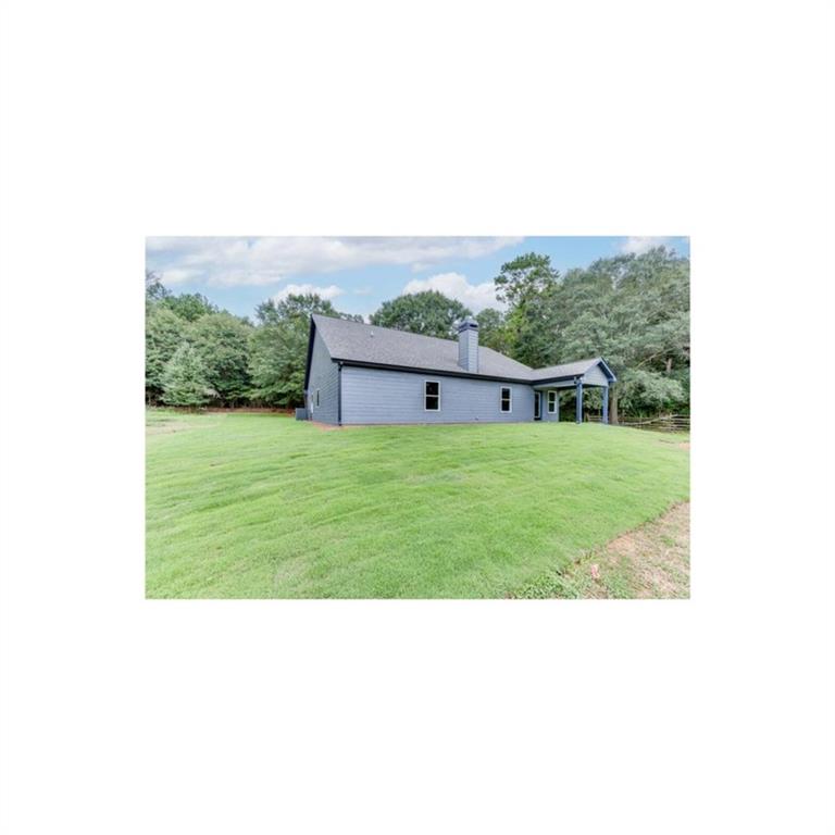 295 Anderson Thomas Road Martin, GA 30557 - Photo 44 of 44 a bathroom with a sink and mirror