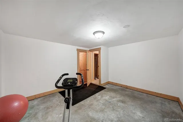 a room with a table and couch