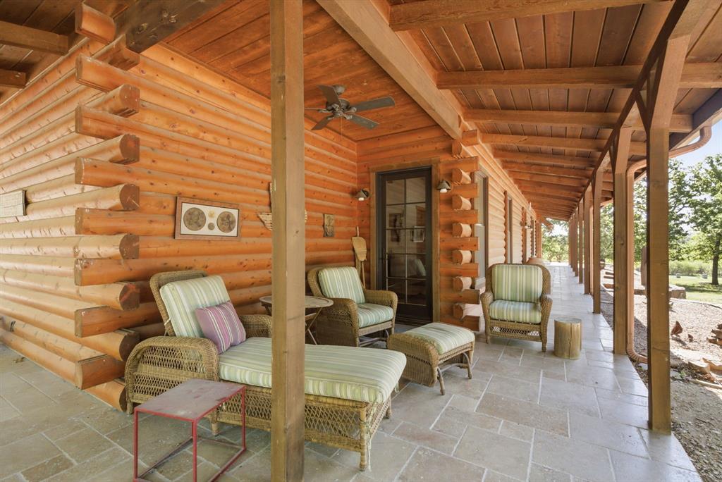 2197 Netherly Lane Forestburg, TX 76239 - Photo 13 of 40 a building outdoor space with patio furniture and potted plants
