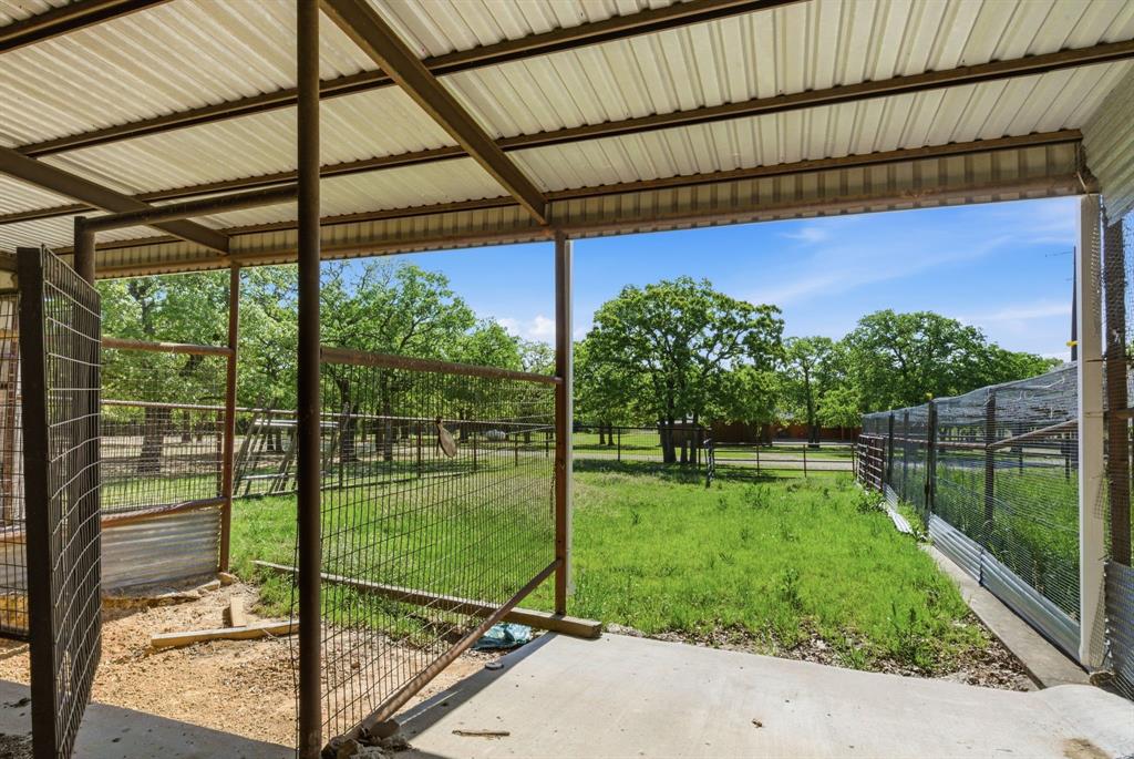 2197 Netherly Lane Forestburg, TX 76239 - Photo 35 of 40 a view of a backyard with a garden