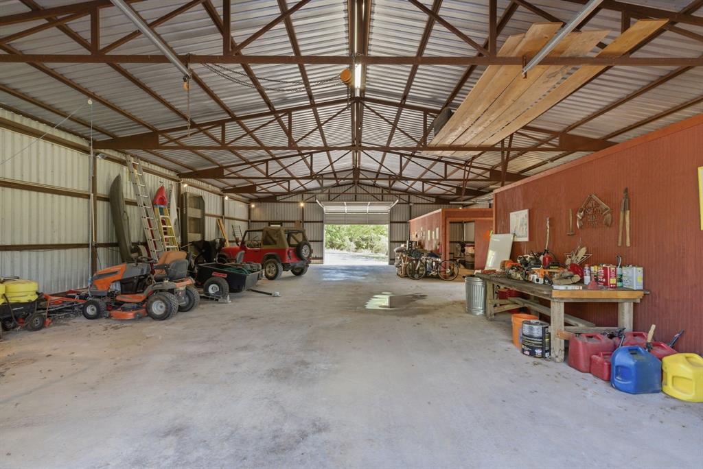 2197 Netherly Lane Forestburg, TX 76239 - Photo 36 of 40 a view of a storage room with lots of stuff