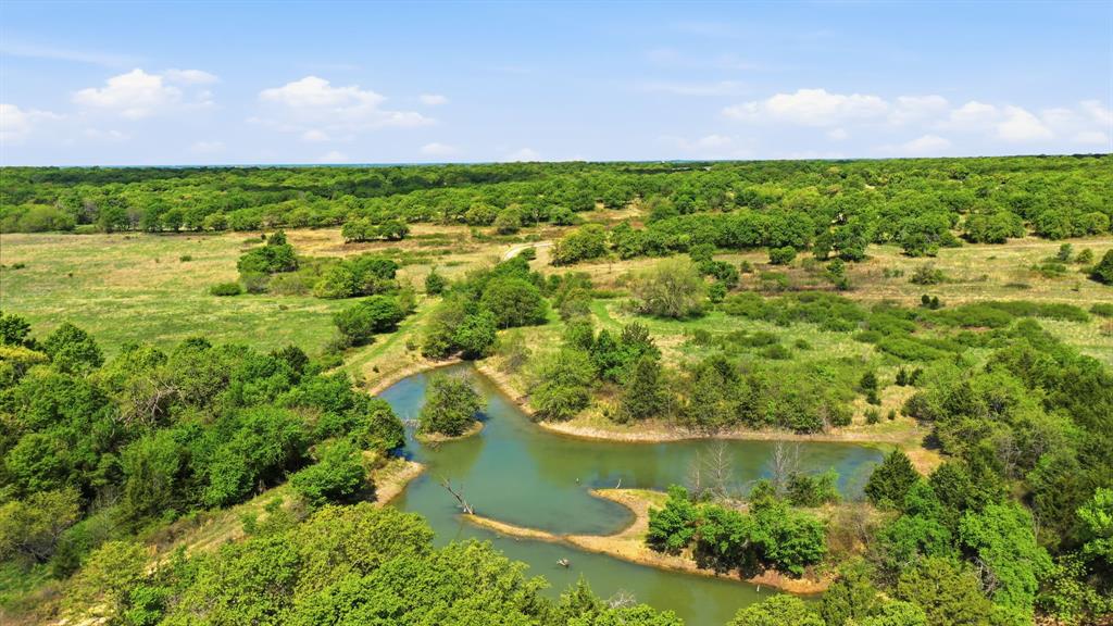 2197 Netherly Lane Forestburg, TX 76239 - Photo 40 of 40 a view of a lake with a house