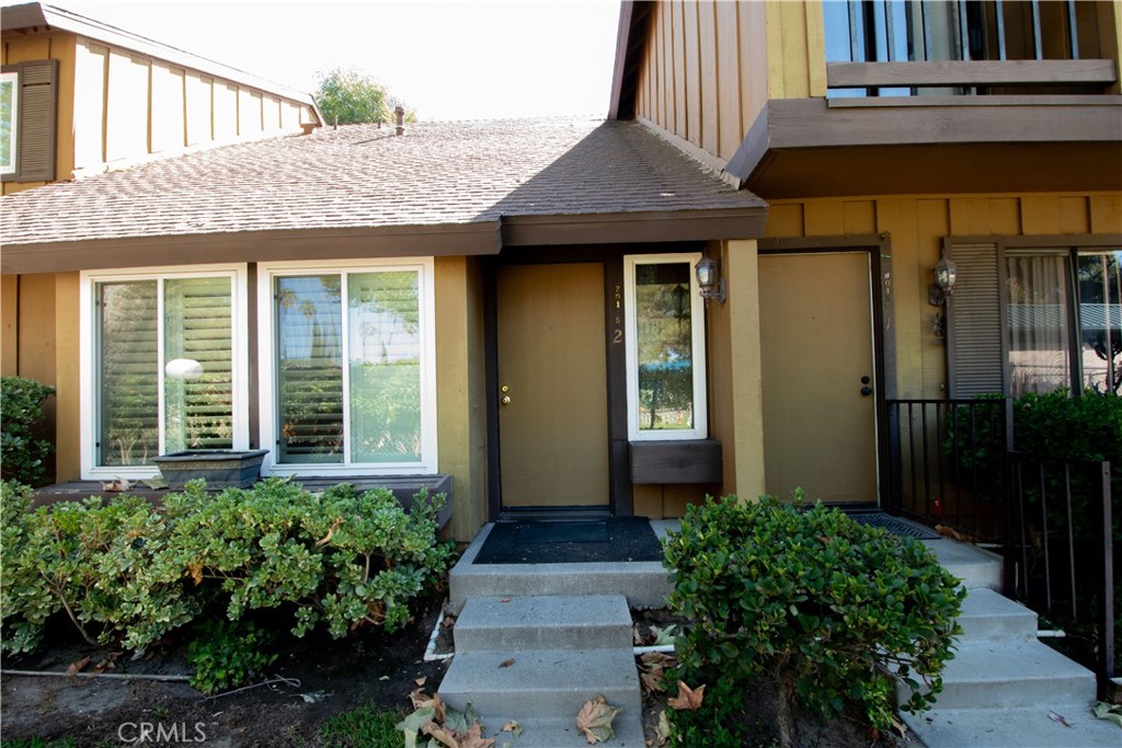a front view of a house having yard