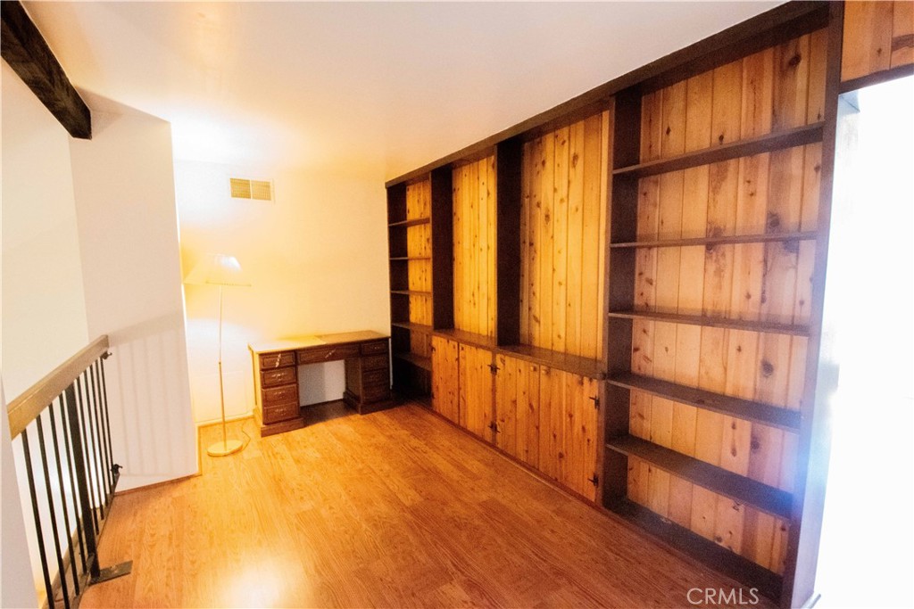 20135 Leadwell Street, Unit 2 Winnetka, CA 91306 - Photo 11 of 21 a bedroom with furniture and a window