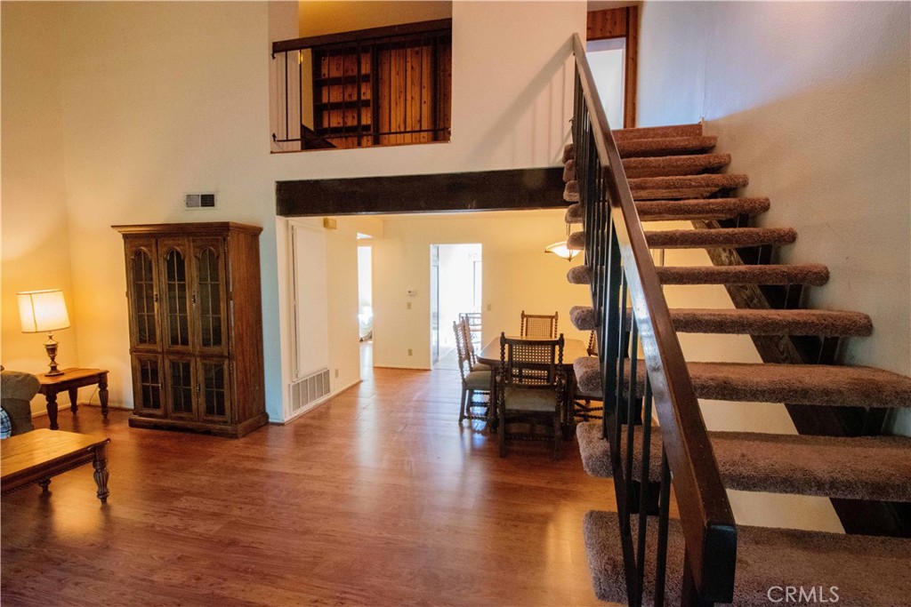 20135 Leadwell Street, Unit 2 Winnetka, CA 91306 - Photo 4 of 21 a view of entryway and hall with wooden floor