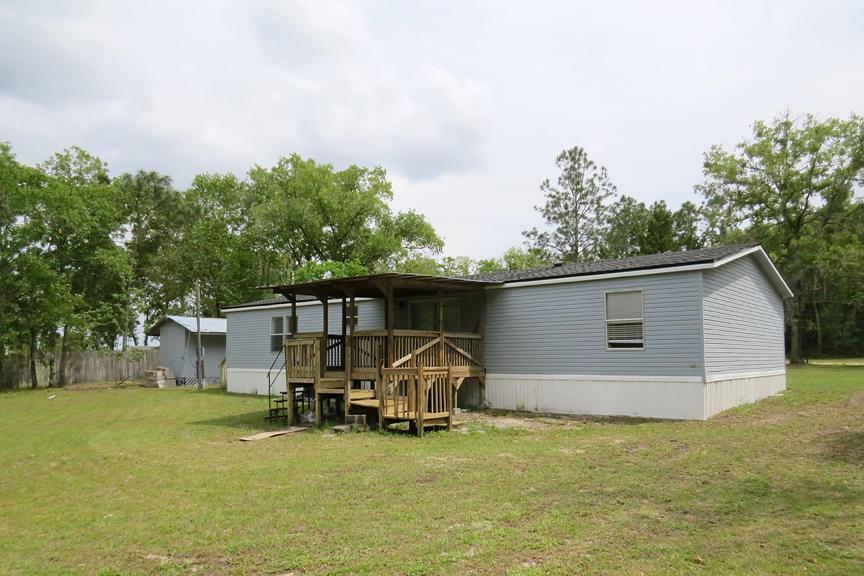 4512 Racoon Run Middleburg, FL 32068 - Photo 31 of 36 Large Back Porch
